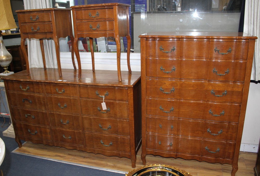 A walnut twelve drawer chest, a matching six drawer chest and pair of bedside tables